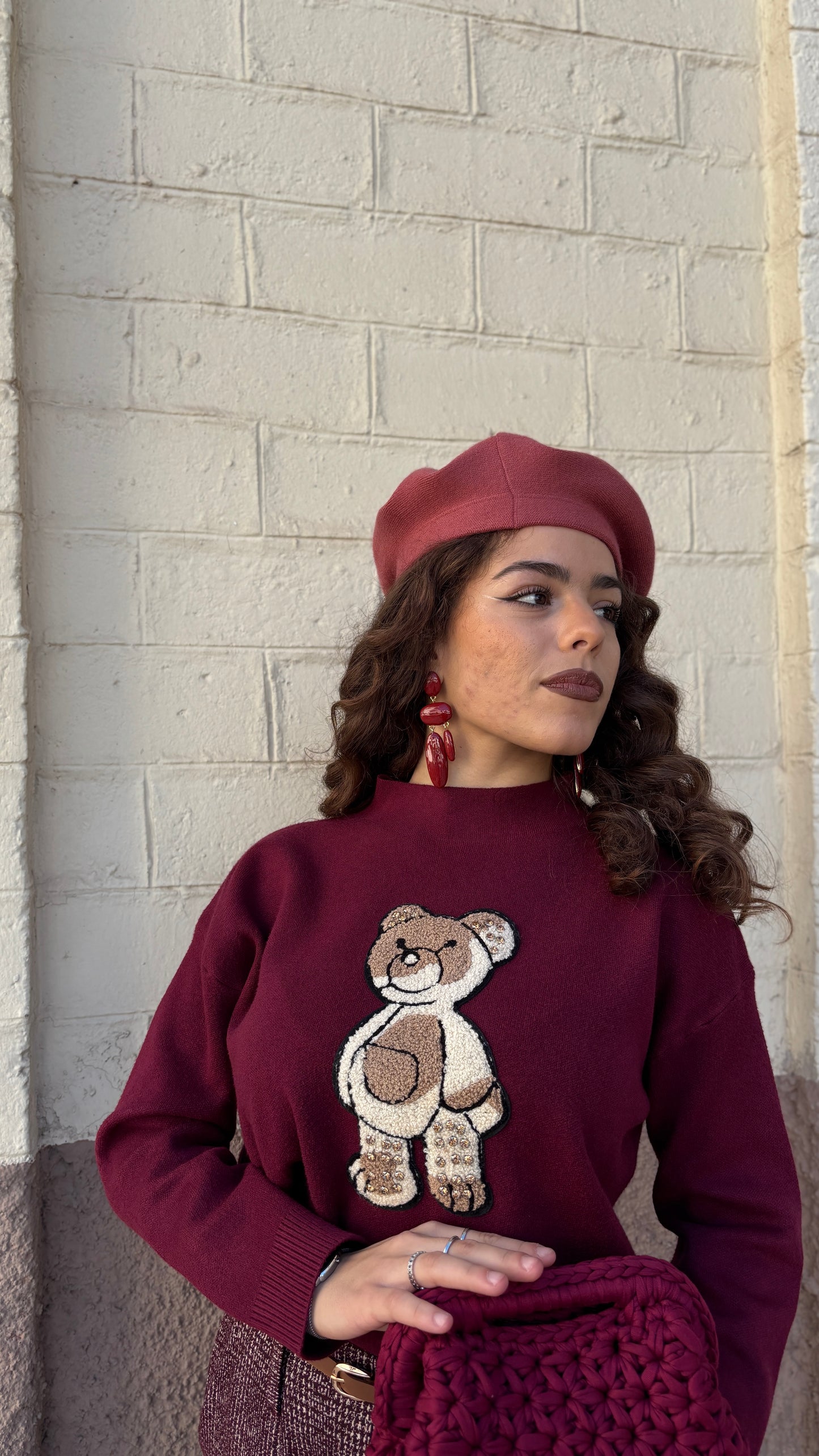 Maglioncino teddy con pietre in rilievo