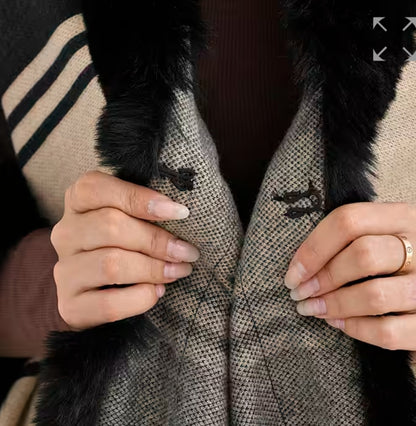 Poncho con ecopelliccia