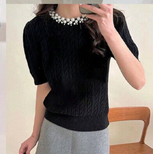 Maglioncino con dettagli sul collo